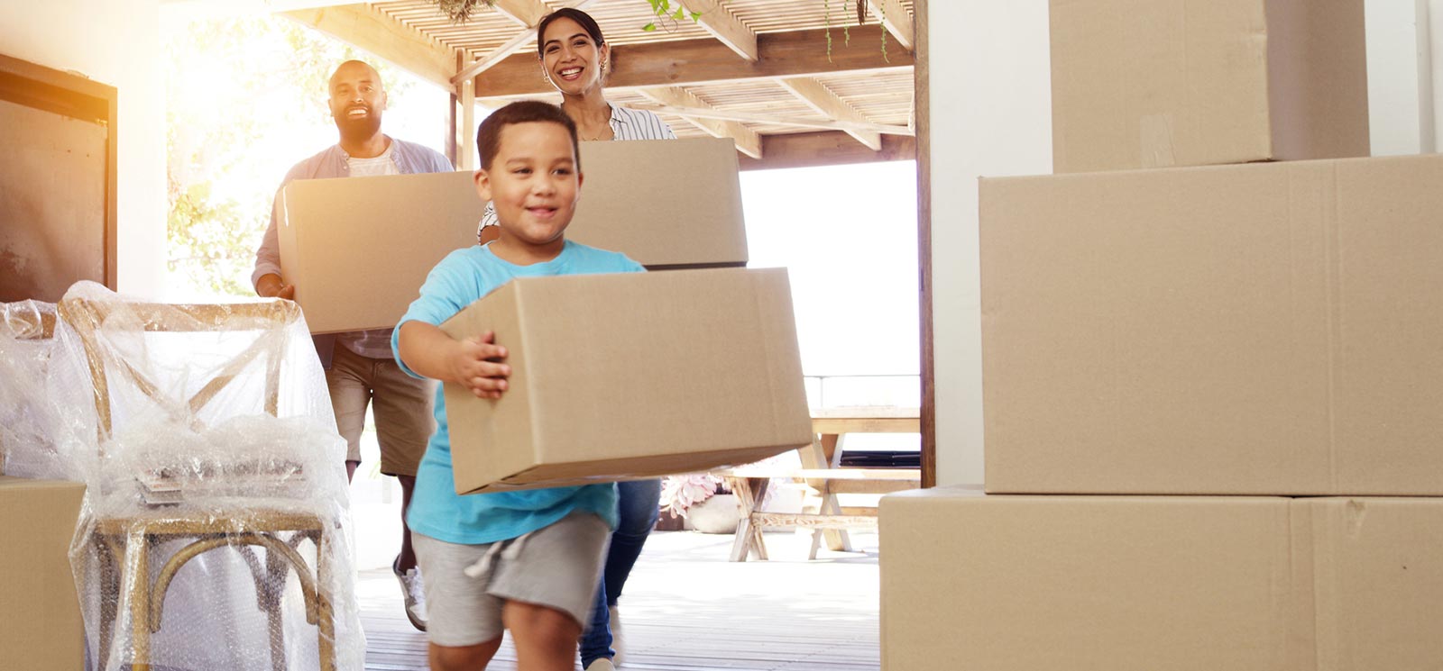 A family moving into their new home